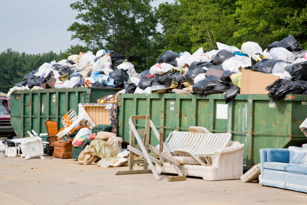 Overflowing roll-off bins at a job site